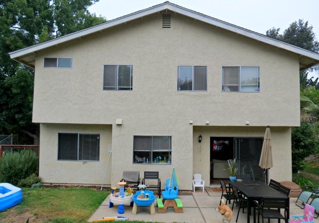 Before and after photos of our window replacement home improvement project. Not a DIY job for us but worth every penny of the cost. We went with vinyl windows instead of wood, and replaced the slider and screen instead of putting in french doors. Read the five biggest lessons we learned. #homeimprovement #diyproject #windows #interiordesign #investment #homedecor #beforeandafter