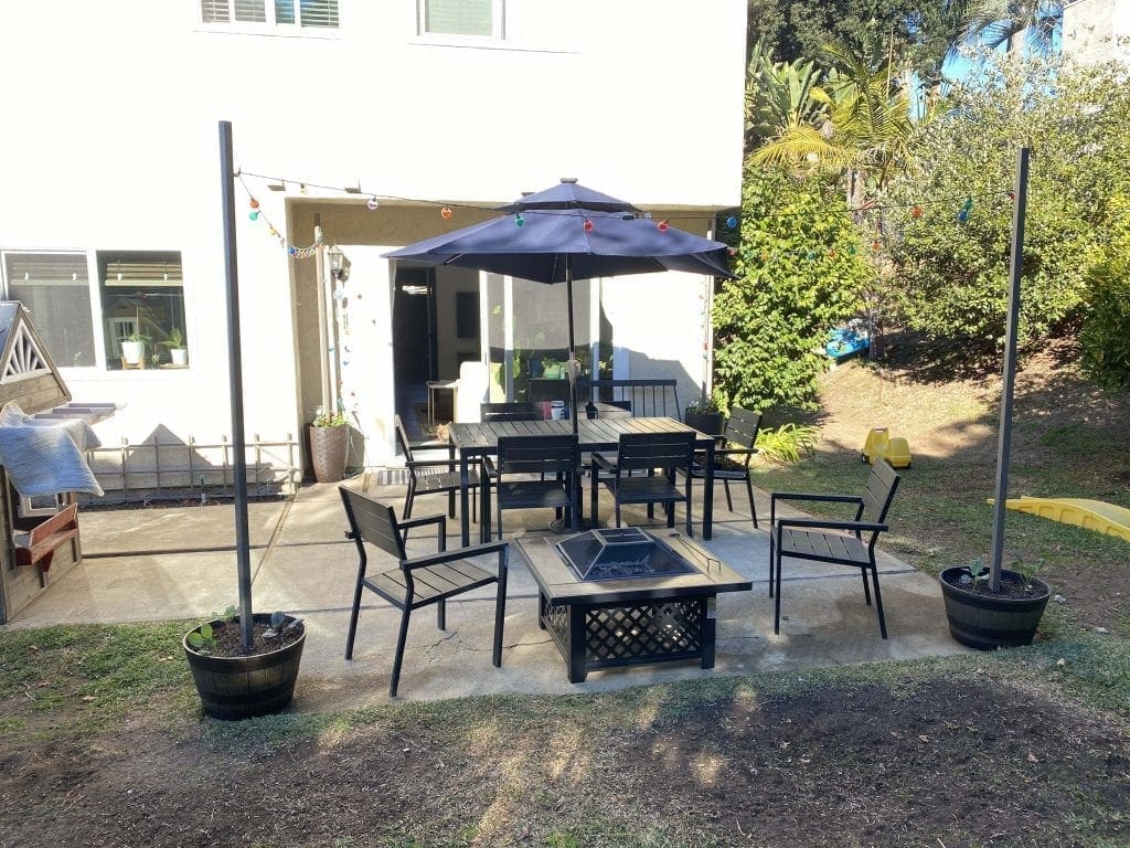 Outdoor string lights poles and planters from Lowes. 