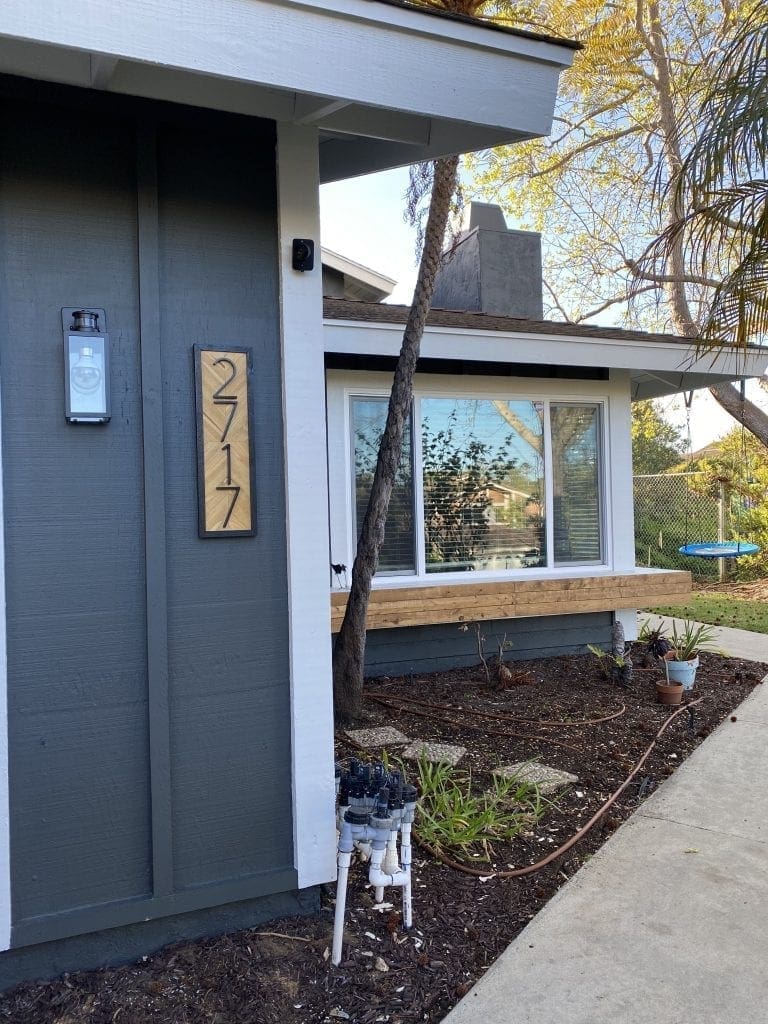 Wood accents on the house painting project to increase curb appeal. 